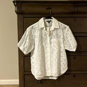 White button down eyelet top. White camisole included.